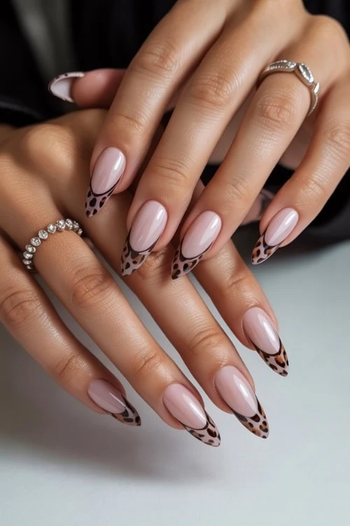 hand with animal print french manicure