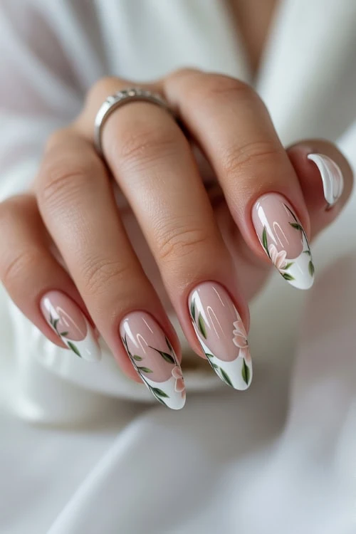hand with floral french tip nails
