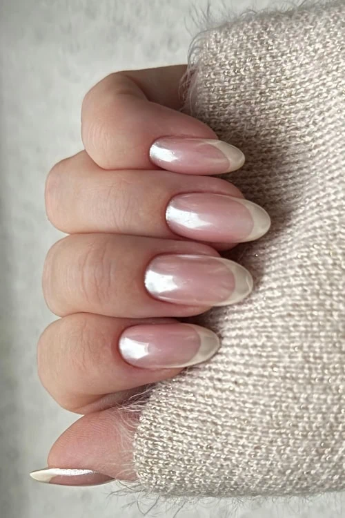 hand with glazed french tip nails