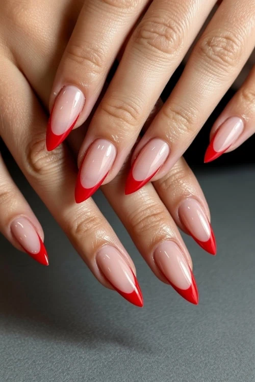 hands with red french manicure