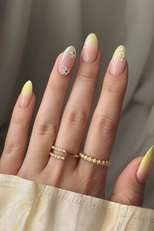 hand with Yellow ombre almond Nails Design