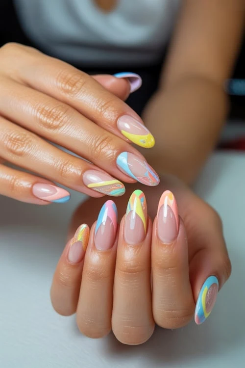 hands with almond shaped nails and pastel design