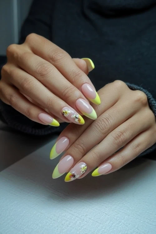 hand with bright cute yellow nails design