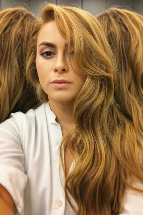 woman with golden brown hair and brown eyes