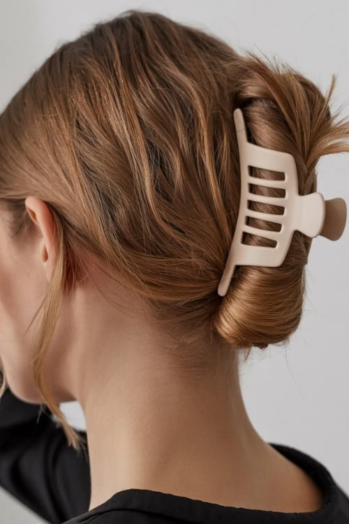 young woman with clip claw updo