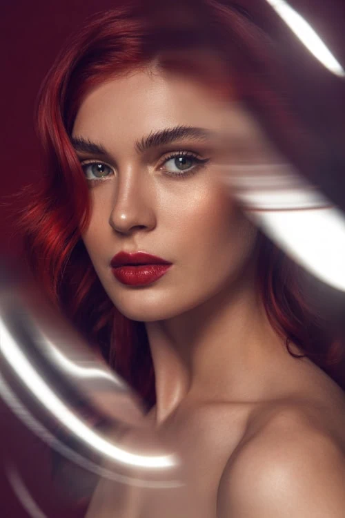 woman with crimson red hair color