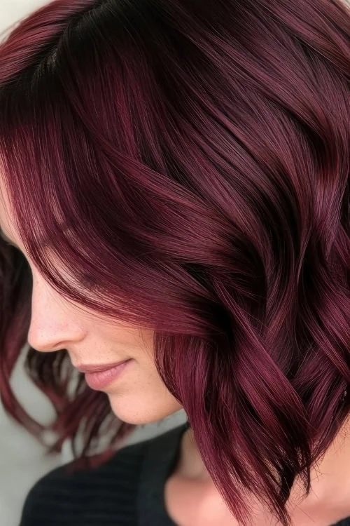 woman with deep burgundy red hair color