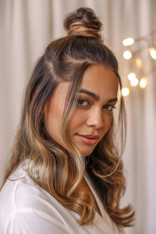 young woman with a half up summer hairstyle 