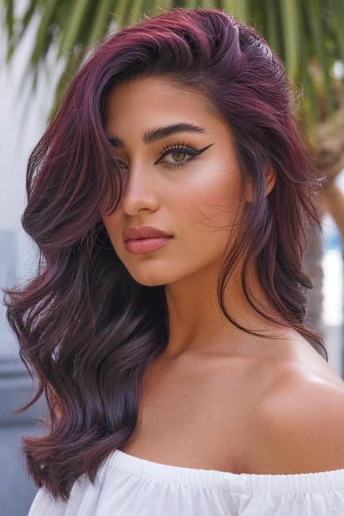 woman with medium length hair in a side wept hairstyle