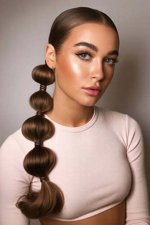 young girl with a bubble braided fall hairstyle