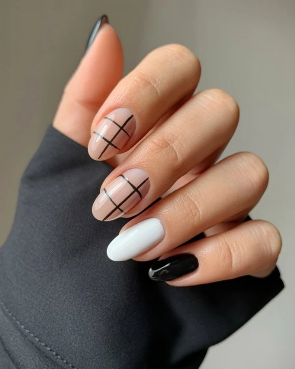 hand with Black & White Nails