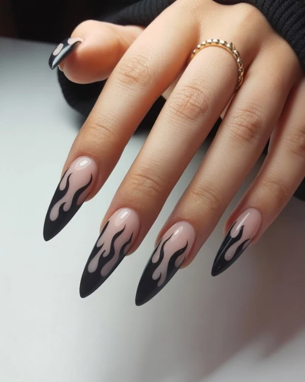 hand with Black Flame Nails