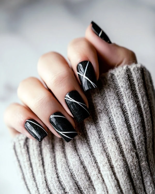 hand with Black Nails Modern With White