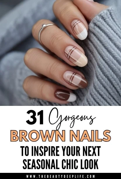 hand with brown nails and neutral nail art