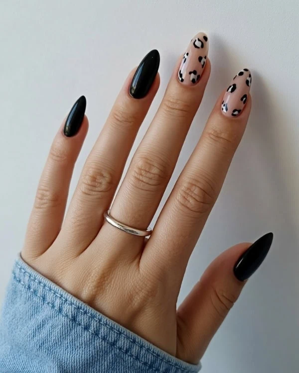 hand with Animal Print Black Nails Design