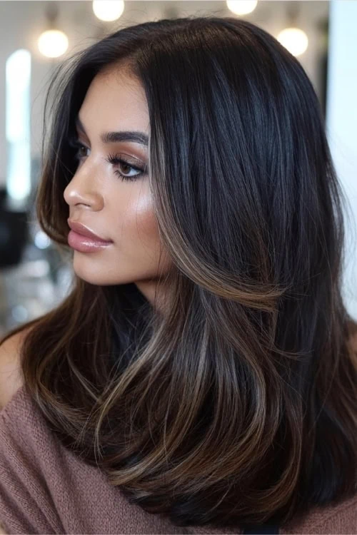 woman with Mocha Melt coloring and a blow out