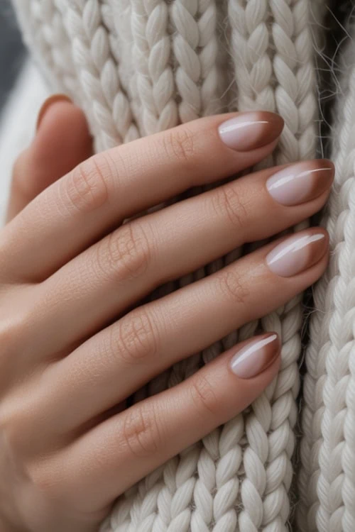 hand with Gradient Brown Nails