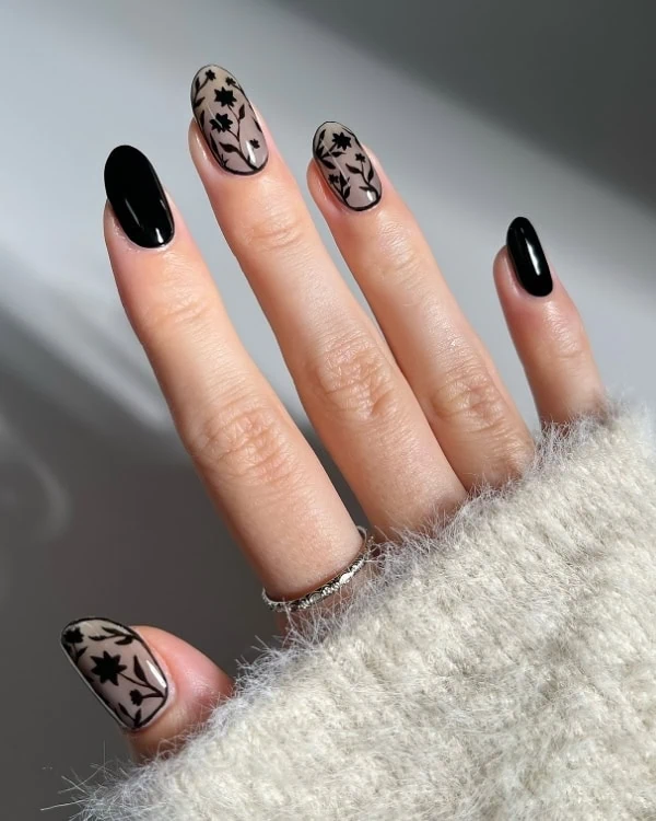 hand with elegant black nails