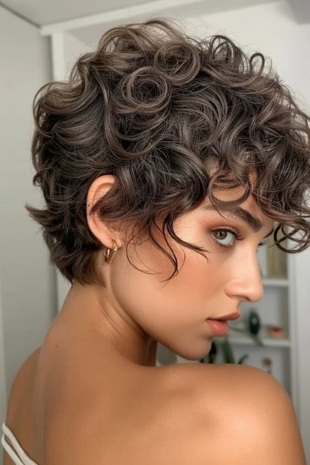 woman with a short haircut that is a Shaggy Curly Pixie