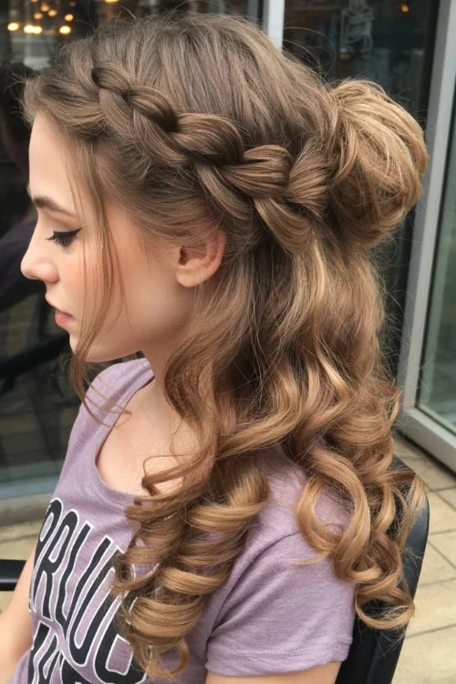 Beautiful curly hairstyle with braided crown and voluminous loose curls for natural hair styling, perfect for special occasions and everyday elegance.