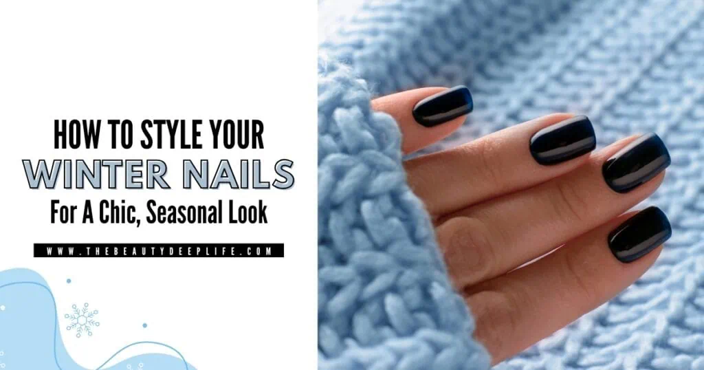 Beautiful winter dark blue nail polish manicure on well-groomed nails against cozy blue knitted background.