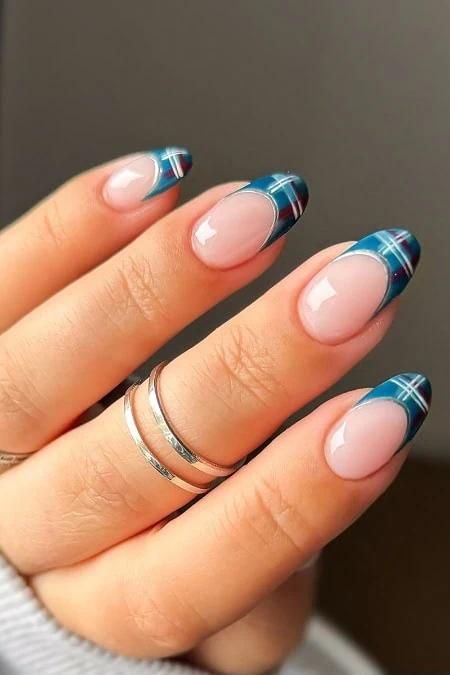 Blue plaid French tip nail art with natural base, perfect for stylish, trendy manicure and nail art designs.