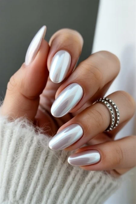 Elegant white ombre gel nails featuring a glossy finish, perfect for a chic and sophisticated look.