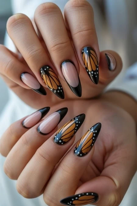 Elegant butterfly nail art with pastel purple and peach tones on almond-shaped nails, featuring detailed butterfly designs for a trendy and delicate look.