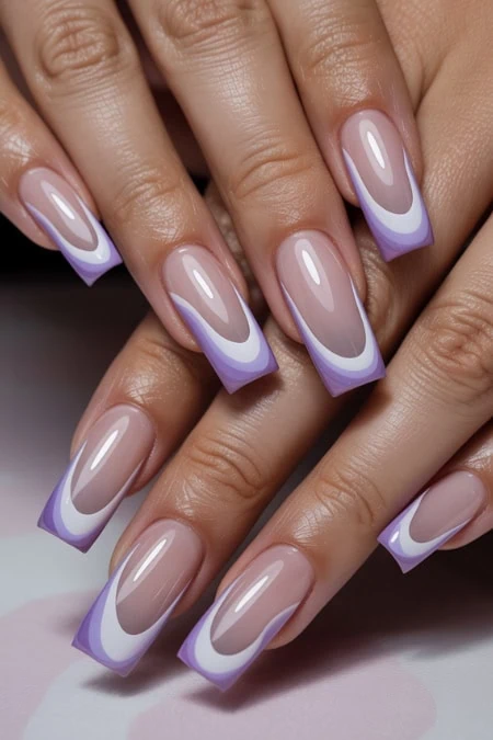 Elegant purple French manicure with glossy finish, perfect for showing off creative nail art and grooming inspiration.