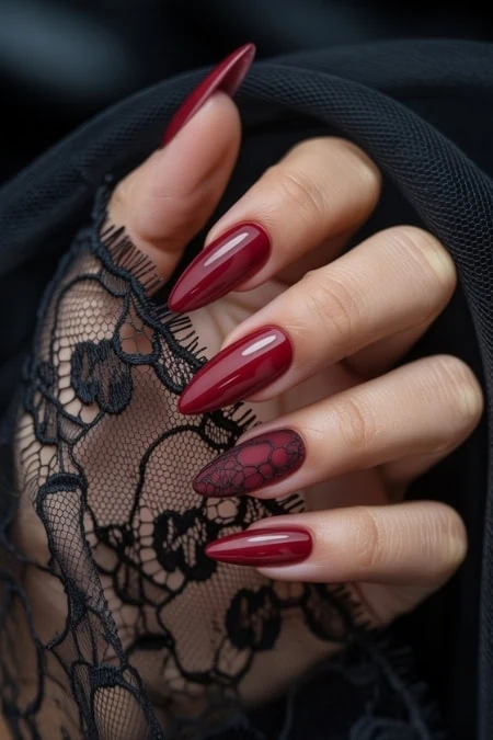 Beautiful red manicured nails with intricate lace glove, showcasing elegant nail art and luxury beauty accessories, perfect for a glamorous beauty and fashion look.