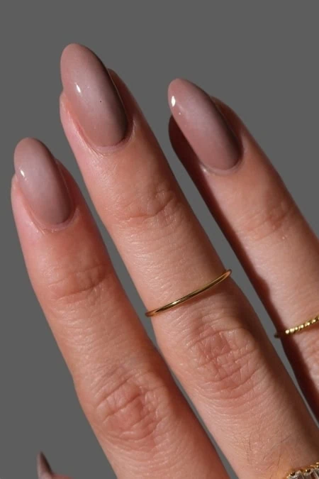 Soft nude gel manicured nails with gold rings on fingertips, elegant and minimalist beauty manicure, beauty and self-care, professional nail art, The Beauty Deep Life.