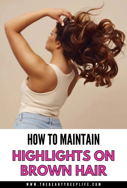 Woman with voluminous, shiny brown hair styled in loose curls, demonstrating hair maintenance tips for highlights and color preservation.