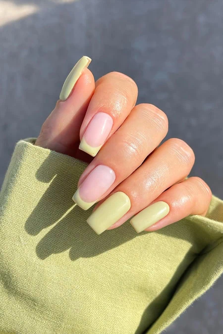 Manicure with natural green and nude shades, showcasing a fresh and elegant nail design. Perfect for beauty and nail care enthusiasts seeking stylish, healthy-looking nails.
