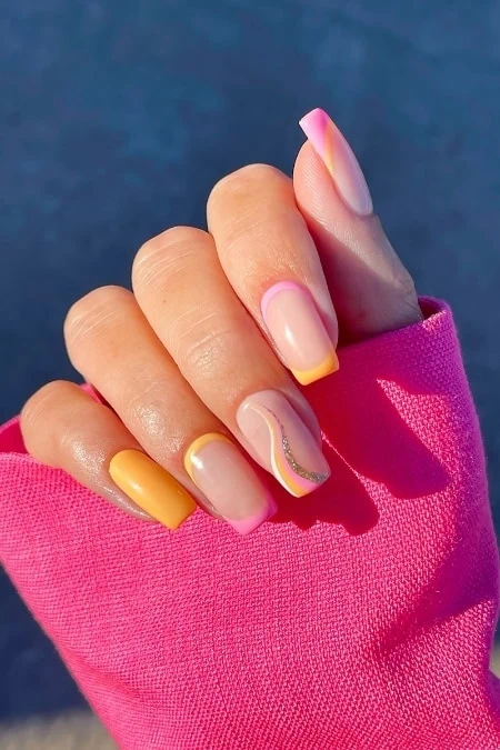 Elegant pastel square nails design with yellow tips and subtle glitter accents, perfect for spring or summer fashion.