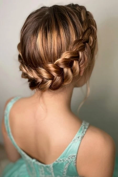 Beautiful braided updo showcasing intricate styling perfect for special occasions or everyday elegance.