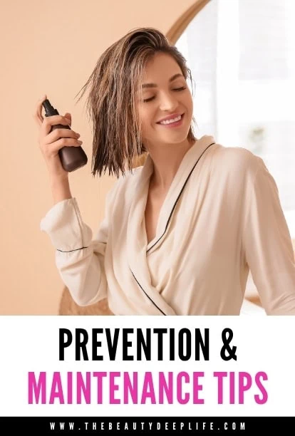 Woman using spray product for styling.