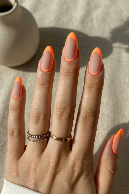 Elegant hand with trendy French manicure.