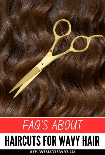 Soft, wavy brown hair with a pair of small, gold-colored scissors resting on top, highlighting hair styling tools and wavy hair texture.