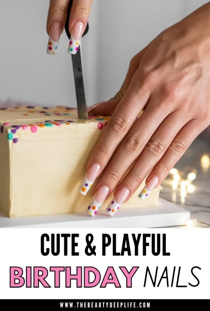 Cute and playful birthday nails with colorful polka dot design on long, manicured fingernails, as a person cuts a birthday cake with a knife, celebrating a festive occasion.