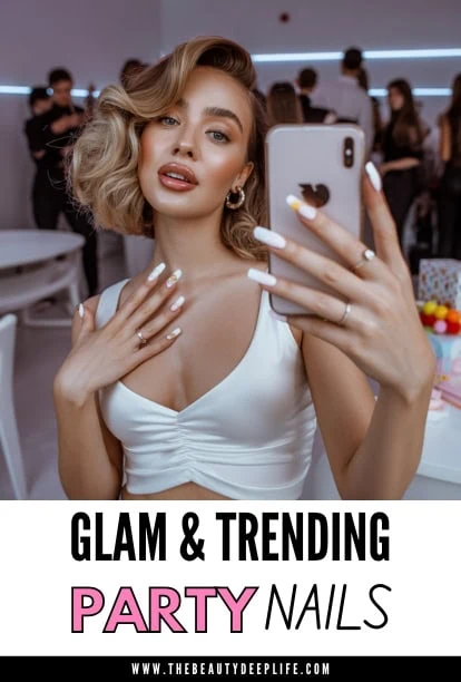 A woman taking a selfie at a glamorous party, showcasing trendy nails and stylish makeup, with a lively background of guests and vibrant decor. Perfect for beauty, fashion, and nail art content.