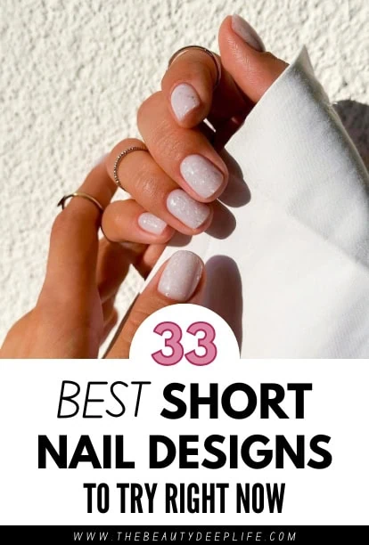 Close-up of a hand with short, neatly manicured nails painted in a soft pink shade, holding a white fabric, with text overlay about short nail designs.