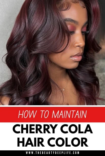 Woman with long, wavy cherry cola hair color, showcasing vibrant, glossy burgundy shades perfect for a bold, stylish look.