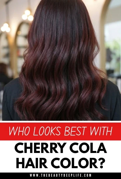 Beautiful woman with long, wavy cherry cola hair color, showcasing rich, vibrant tones in a salon setting.