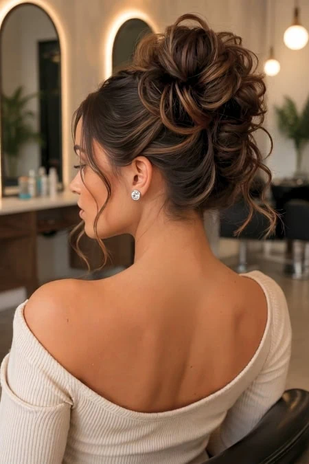Elegant updo hairstyle with intricate design, perfect for homecoming events, showcasing a sophisticated and stylish look.