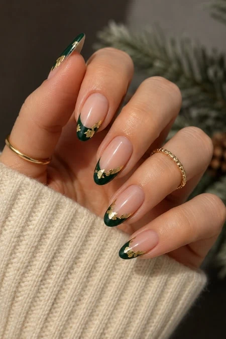 Elegant green and gold French manicure on natural nails, perfect for all-year-round style and beauty.