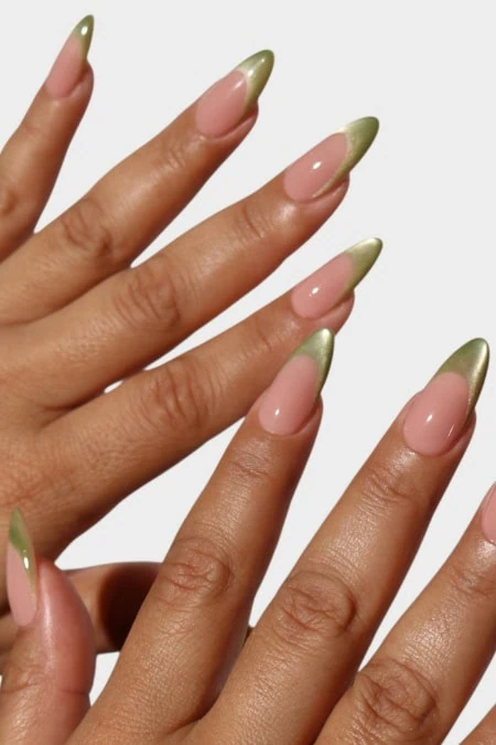 Elegant green and nude nail design with a glossy finish, perfect for all year round, showcased on well-manicured hands.
